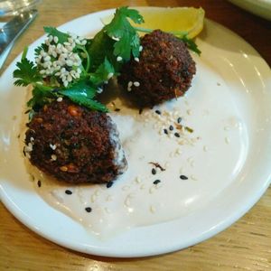 Side of 3 green falafel with fab tahini sauce at Mildreds - Soho in London