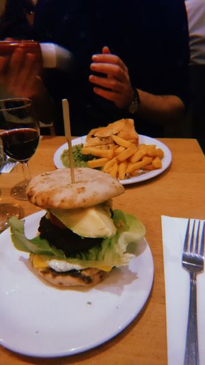 Mexican black Bean and sweet potato burger with chilli, sweetcorn relish, tomatillo coriander mayo, lettuce, onion and additional avocado and vegan cheese  at Mildreds - Soho in London