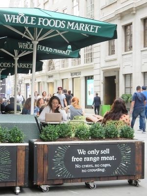 "We only sell free range meat" sign at the terrace at Whole Foods Market - Piccadilly in London