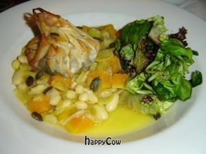 Phyllo Purse stuffed with Rosemary and Wild Mushrooms served with Pumpkin, Leek, Cannelini Beans and Basil Casserole topped with Pumpkin Seeds at Carnevale in London