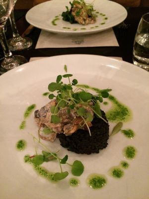 Black Rice Cake on Wilted Greens and Creamy Mushrooms. at The Gate - Hammersmith in West London