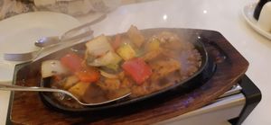 Sizzling black bean sauce with tofu at Loving Hut in North London