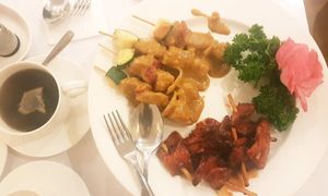 Chicken Satay Skewers and BBQ ribs at Loving Hut in North London