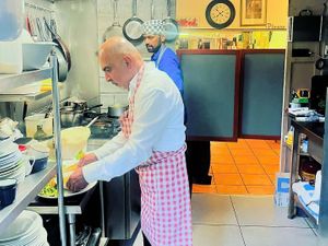 Ritchie in the kitchen at Canela Cafe, Hampton Court at Riverside Vegetaria in Kingston Upon Thames