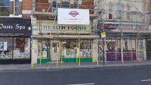 Outside with scaffolding at Health Foods in South West London