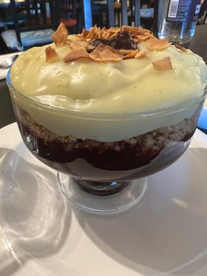 Berry crumble with custard. So good tart and sweet ! at Manna London Restaurant - Maybe closed in North West London