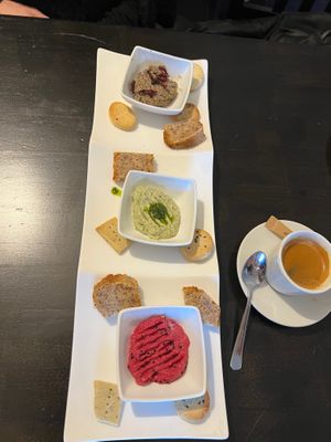 Sharing platter of homemade dips and bread/crackers at Manna London Restaurant - Maybe closed in North West London