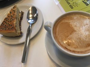 Soya Latte & Vegan Gluten Free Raw Passion Fruit & Mango Cheesecake at Earth Cafe in Manchester