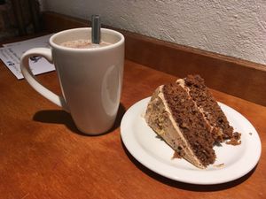 Coconut milk chai latte & nut cake at Earth Cafe in Manchester