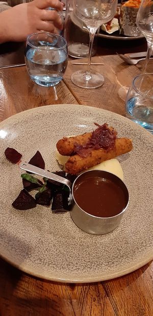 Cheese sausages with mustard mash and gravy at Greens in Manchester