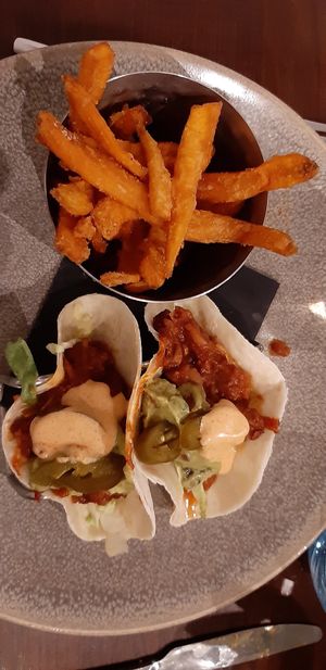 Tacos with sweet potatoes fries at Greens in Manchester