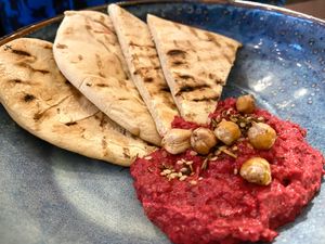 Beetroot hummus and flatbread  at Greens in Manchester
