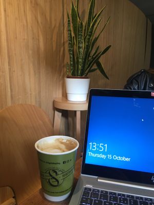 Coffee in the cafe  at The 8th Day in Manchester