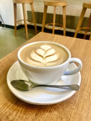 Oat chai latte  at The 8th Day in Manchester