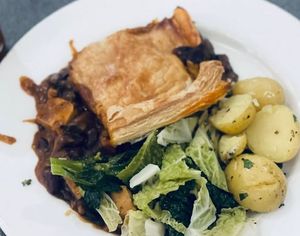 Tofu & Mushroom Pie with mixed veg side at The 8th Day in Manchester