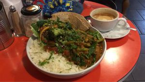 Vegan curry and flat white with oat milk at The Zoo in Hull
