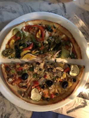 The ‘big one’ and ‘rain forest’ pizzas with vegan cheese at Zeffirellis in Ambleside