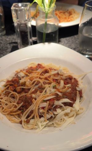 Vegan lentil bolognese with vegan cheesee  at Zeffirellis in Ambleside