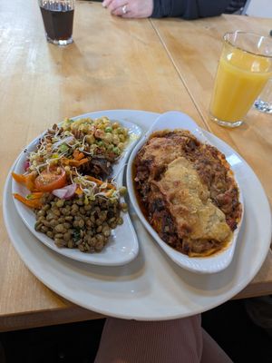 Lasagna with a trio of side salads at The Whale Tail Cafe in Lancaster