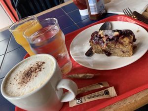 Banana loaf and oat milk cappuccino   at The Egg Cafe in Liverpool