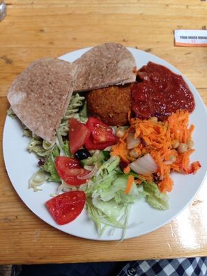spicy bean burger with pita and salad at The Egg Cafe in Liverpool