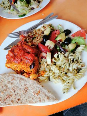 Pitta and vegan burger with salad at The Egg Cafe in Liverpool