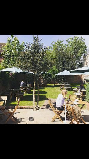 The beautiful secluded walled garden open all year round.  at Cafe Paradiso in Chichester