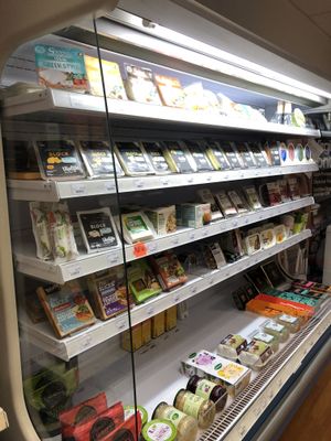 Massive fridge containing vegan cheese and faux meats at The Health House in Chatham