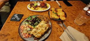 Spinach and mushroom lasagne, chilli nachos and garlic bread at Herbies in Exeter