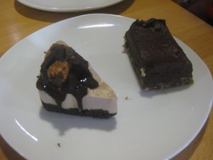 Raw peanut butter and chocolate cheesecake and chocolate avocado mousse (both vegan) at Archie Browns Health Food in Penzance
