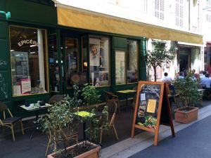 Patio and indoor seating for the tea room at the front of the store (pastries can be selected from a case inside). at Country Life in Marseille