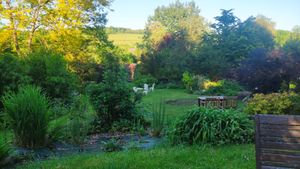 Garden overlooking the hills at La Maison du Vert in Ticheville