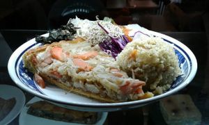 Organic Vegetable tarte, carrots and oignons, brown rice, salads, algae, pickles at Grand Appetit in Paris