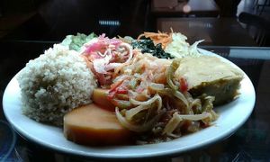 Macrobiotique assiette: balanced healthy organic food, whole rice, quinoa, lentils paté, wakame and home made pickles at Grand Appetit in Paris
