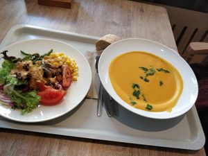 Carrot soup and mixed salad at Osho's Place in Cologne