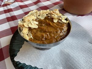 Warm apricot compote with almond flakes    at Tassajara in Hamburg