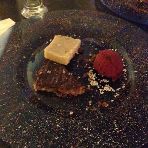 Dessert variety: cranberry chocolate cake, pear parfait, berry sorbet at Hiller in Hannover