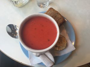 Beetroot and coconut milk soup with bread and hummus  at Kaffihusid Gardurinn - Ecstasy's Heart-Garden in Reykjavik