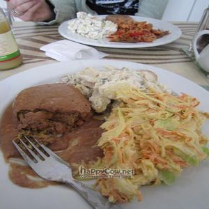 Lentil Burger with Peanut Sauce, plus potato salad & coleslaw.  at Quay Co-op Cafe - Sullivan's Quay in Cork