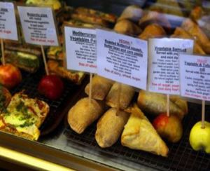 fresh tray of vegan pastys and vegan pizzas were loaded into the pastry case at Blazing Salads in Dublin