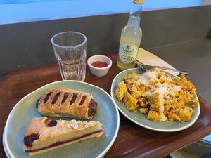 Raspberry almond bakewell, tofu scramble on delicious seeded bread, flaky sausage roll #Veganuary at Cornucopia in Dublin
