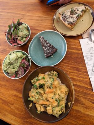 Thai green curry, potato salad, beet salad, coconut & chocolate tarte, and quiche in the upper corner.  The quiche was my favorite! at Cornucopia in Dublin