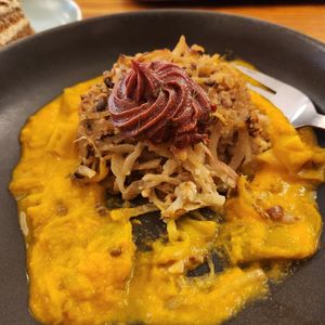 Potato & cauliflower cake on carrot & leek ragout and topped with a beet paste at Cornucopia in Dublin