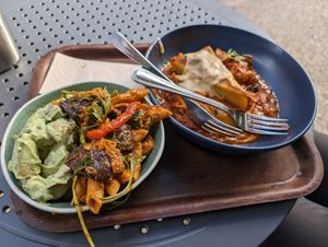 Delicious potato salad and penne salad on the left, polenta with cheese sauce and ragu on the right at Cornucopia in Dublin