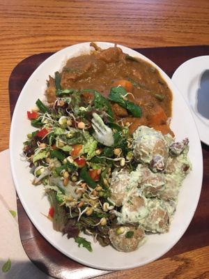 Curry with rice and two salads at Cornucopia in Dublin