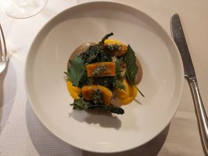 Purees and crunchy black cabbage with herbs and pumpkin at Joia Alta Cucina Naturale in Milan