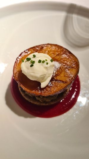 Tatin di melanzana alla giapponese leggermente fritta, su biscotto di grano saraceno, emulsione di prugne e zenzero, quark ed erba cipollina at Joia Alta Cucina Naturale in Milan