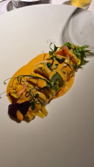 Tagliolino "paglia e fieno" con una salsa alla magrebina, brodo chiarificato con i profumi dell'Andalusia, entrambi serviti freschi at Joia Alta Cucina Naturale in Milan