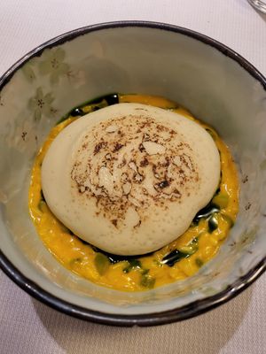 Risotto creamed with carrots, flamed asparagus, wild garlic emulsion,  soft curry mouse at Joia Alta Cucina Naturale in Milan