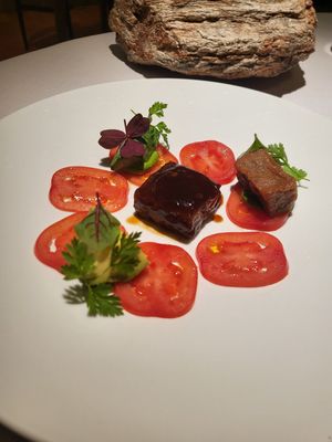 Tomato carpaccio, agedashi eggplant, marinated avocado, house made lentil tempeh at Joia Alta Cucina Naturale in Milan
